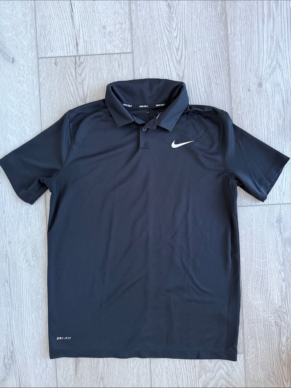 Nike Black Polo with White Swoosh